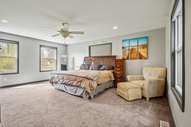 carpeted bedroom featuring visible vents, a ceiling fan, and recessed lighting