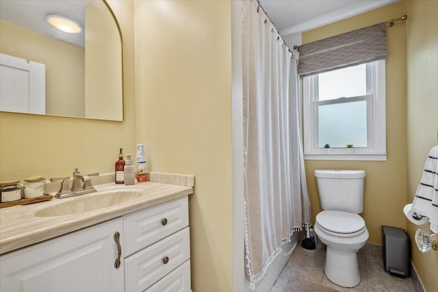 bathroom with toilet, tile patterned floors, a shower with shower curtain, and vanity