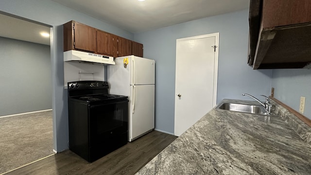 kitchen with freestanding refrigerator, black range with electric cooktop, dark wood-style flooring, under cabinet range hood, and a sink