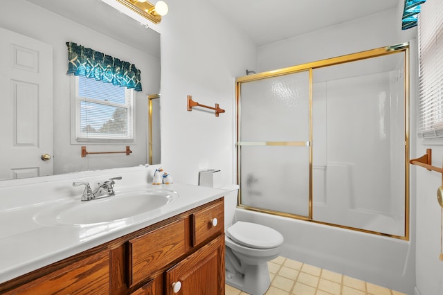 2796 Eagle Harbor Ave, Portage, MI 49024 - full bath featuring vanity, bath / shower combo with glass door, tile patterned floors, and toilet