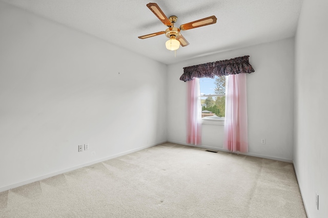2796 Eagle Harbor Ave, Portage, MI 49024 - unfurnished room with baseboards, ceiling fan, carpet, and visible vents