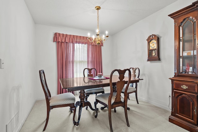 2796 Eagle Harbor Ave, Portage, MI 49024 - dining room with a chandelier, baseboards, visible vents, and light carpet