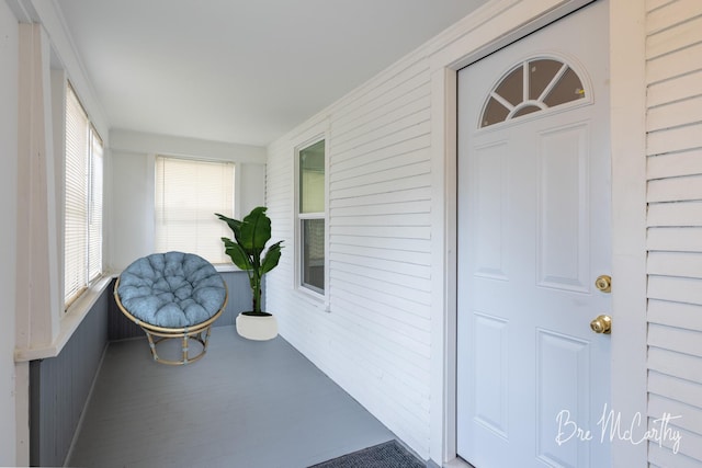 sunroom with wood finished floors