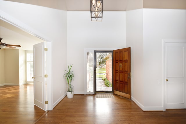 32824 Outland Trl, Bingham Farms, MI 48025 - entryway featuring ceiling fan, baseboards, a high ceiling, and wood finished floors