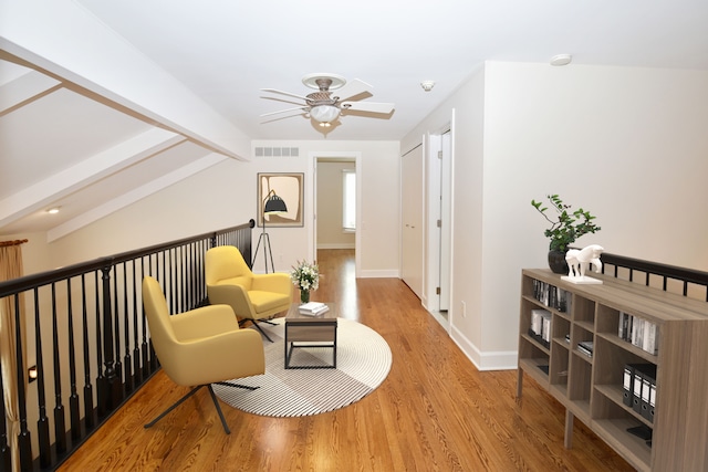 32824 Outland Trl, Bingham Farms, MI 48025 - sitting room with a ceiling fan, visible vents, wood finished floors, baseboards, and vaulted ceiling with beams