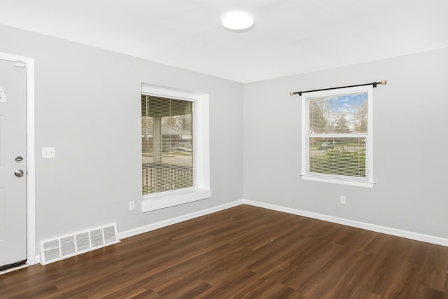 16516 Collingham Dr, Detroit, MI 48205 - empty room featuring baseboards, wood finished floors, and visible vents