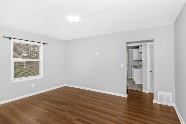 16516 Collingham Dr, Detroit, MI 48205 - unfurnished room with visible vents, baseboards, and wood finished floors