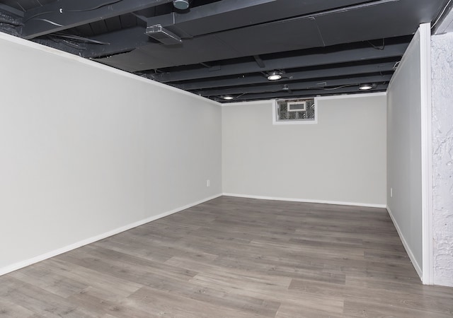 16516 Collingham Dr, Detroit, MI 48205 - finished below grade area featuring baseboards and wood finished floors