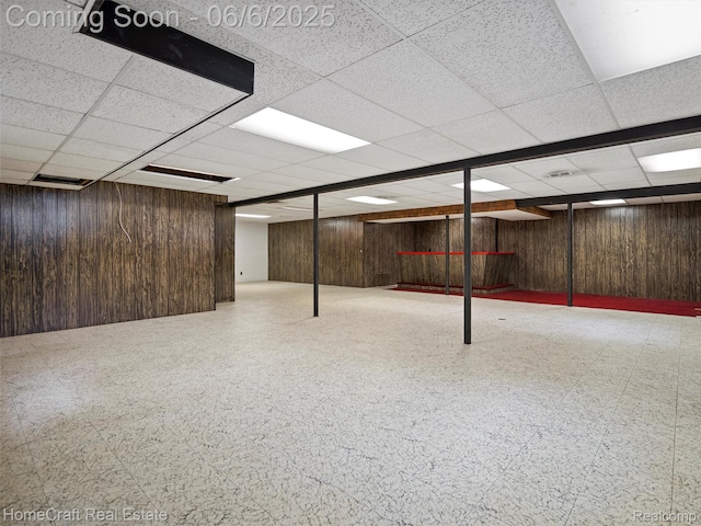28210 Ridgebrook Rd, Farmington Hills, MI 48334 - finished below grade area featuring wood walls, tile patterned floors, and a drop ceiling