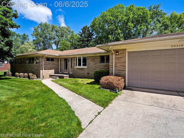 28210 Ridgebrook Rd, Farmington Hills, MI 48334 - ranch-style home featuring a front yard, brick siding, driveway, and an attached garage