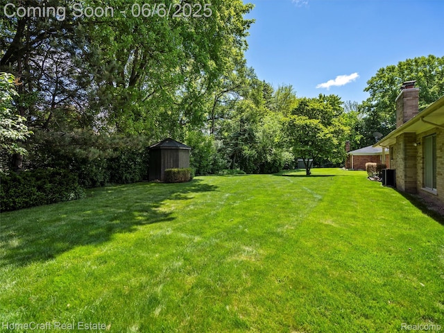 28210 Ridgebrook Rd, Farmington Hills, MI 48334 - view of grassy yard featuring central air condition unit