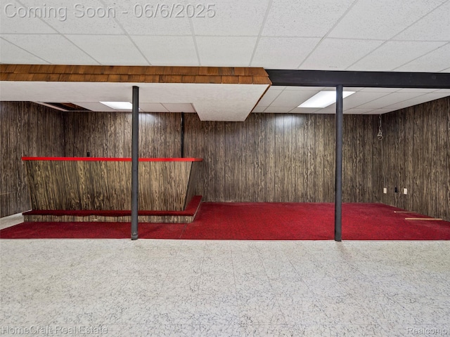 28210 Ridgebrook Rd, Farmington Hills, MI 48334 - finished below grade area featuring wooden walls, a drop ceiling, and tile patterned floors