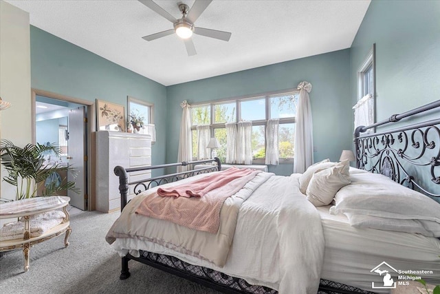 bedroom featuring carpet floors and ceiling fan