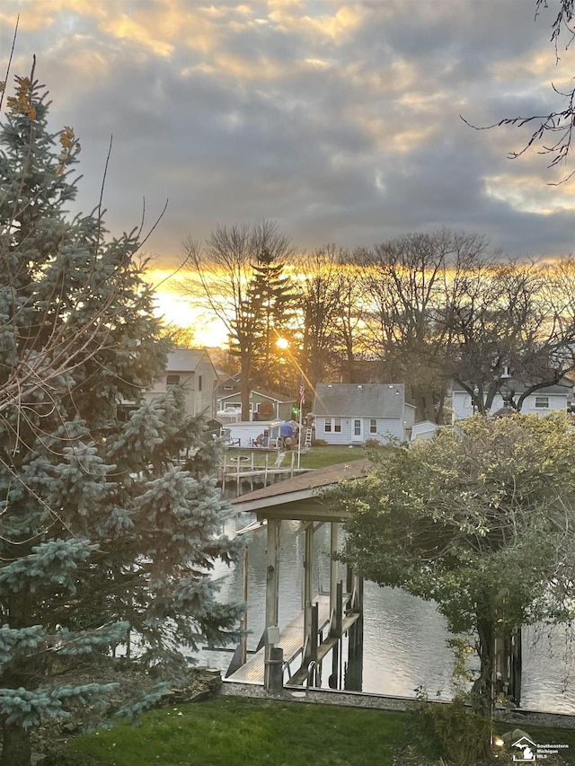 30500 Bayview St, Gibraltar, MI 48173 - water view with a boat dock, nearby suburban area, and boat lift