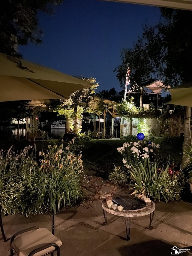 30500 Bayview St, Gibraltar, MI 48173 - view of patio at night
