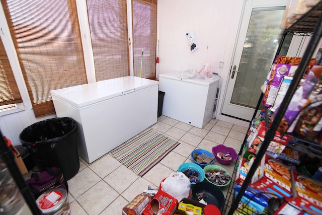 53240 Hemlock Lake Rd, Marcellus, MI 49067 - laundry room featuring washer / clothes dryer and light tile patterned floors