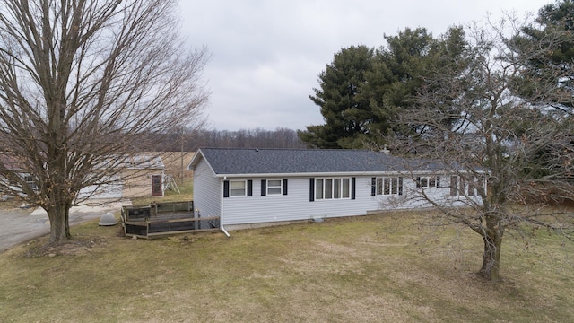 53240 Hemlock Lake Rd, Marcellus, MI 49067 - view of front of house featuring a shingled roof and a front yard