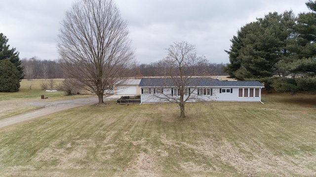 53240 Hemlock Lake Rd, Marcellus, MI 49067 - view of front facade with dirt driveway and a front yard