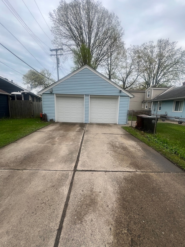detached garage with fence