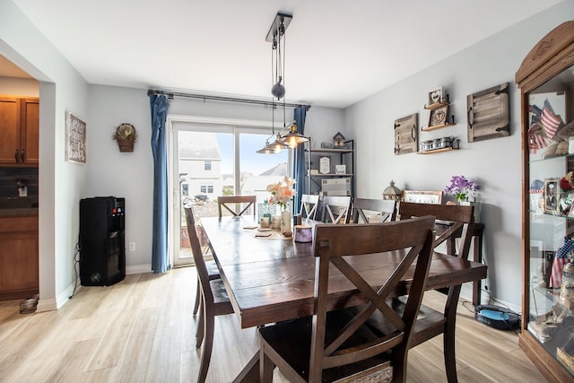 15000 Tiara Ave, Monroe, MI 48161 - dining room featuring baseboards and light wood-style floors
