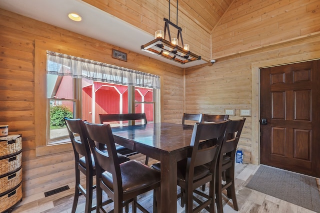 dining space with a healthy amount of sunlight, high vaulted ceiling, recessed lighting, and visible vents