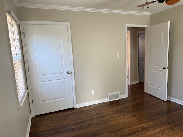 800 Cambridge Rd, Berkley, MI 48072 - unfurnished bedroom with baseboards, dark wood finished floors, and ornamental molding
