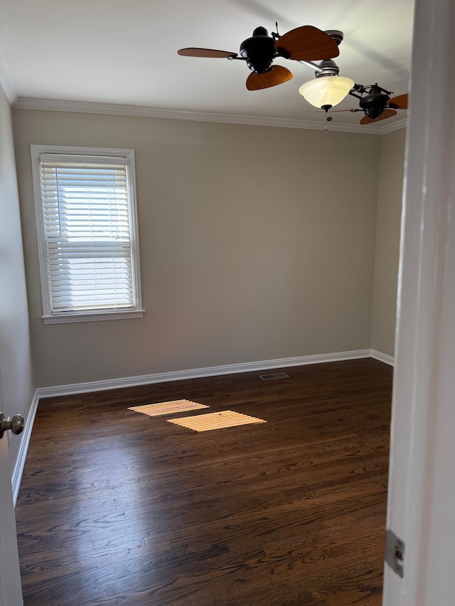800 Cambridge Rd, Berkley, MI 48072 - empty room featuring ornamental molding, baseboards, and dark wood finished floors