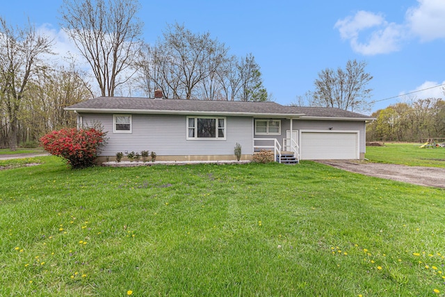 ranch-style home featuring an attached garage, a chimney, a front lawn, and aphalt driveway