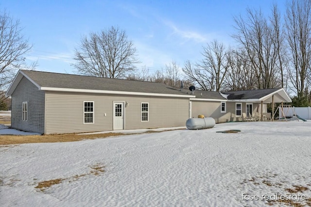 4731 N Osborn Rd, Riverdale, MI 48877 - view of snow covered house