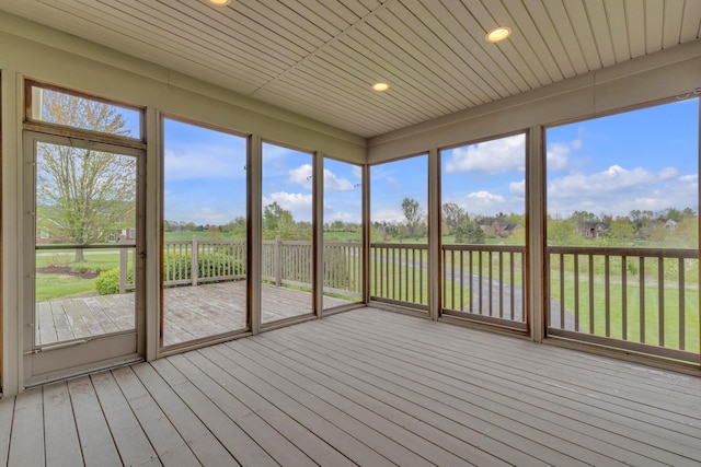 9080 Emerson Dr, Saline, MI 48176 - unfurnished sunroom featuring recessed lighting, a wooden deck, wood ceiling, and hardwood / wood-style flooring