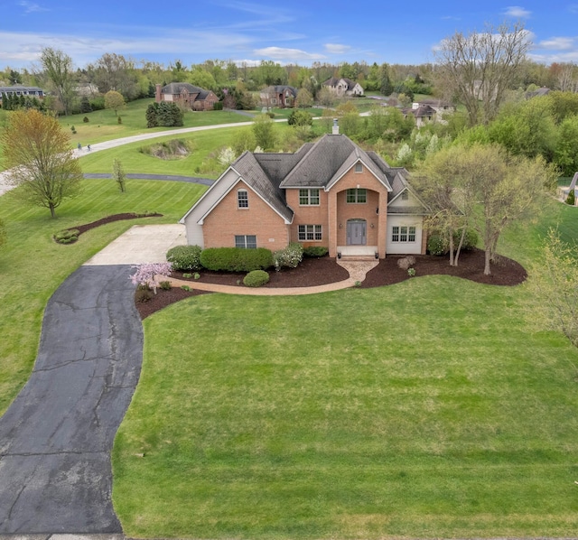 9080 Emerson Dr, Saline, MI 48176 - view of front of house with a front yard