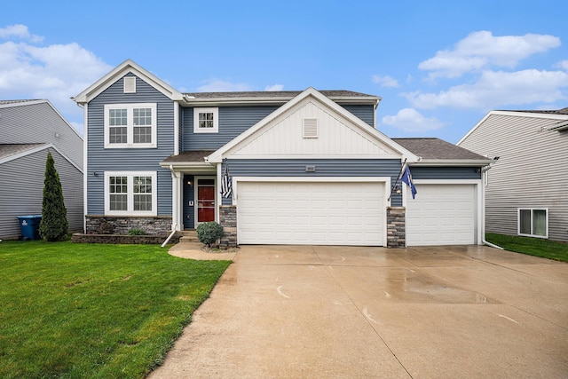 view of front of property with board and batten siding, driveway, a garage, a front lawn, and stone siding