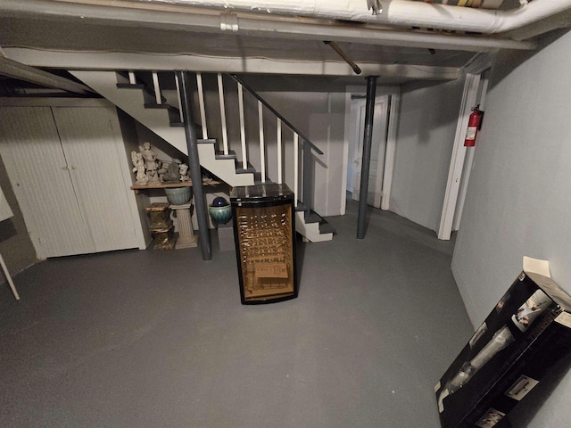 finished below grade area featuring stairs