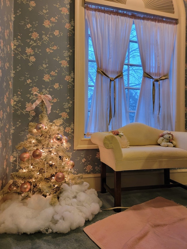 interior details featuring carpet floors and wallpapered walls