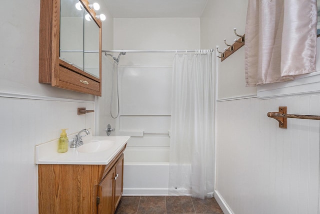 bathroom featuring vanity and shower / tub combo