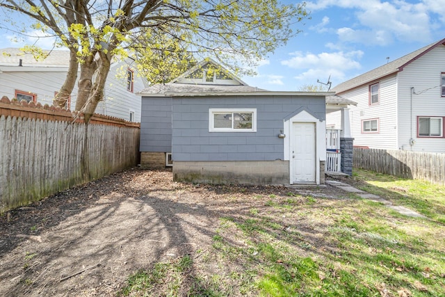 507 S Lincoln St, Bay City, MI 48708 - rear view of property with a fenced backyard