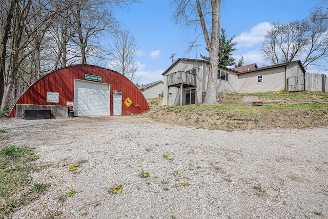 view of outbuilding featuring an outbuilding and driveway