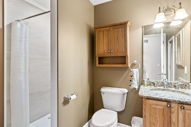 full bathroom with vanity, toilet, a shower with curtain, and visible vents