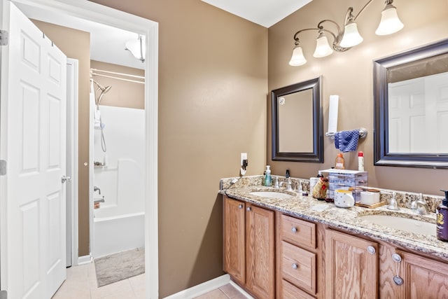 full bathroom featuring tile patterned flooring, a sink, and double vanity