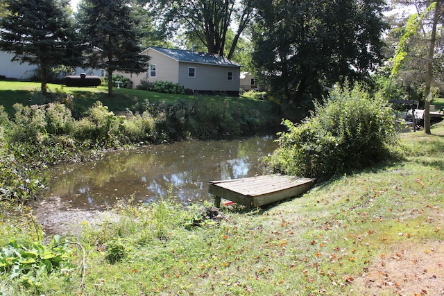 17980 1ST Callejon, Barryton, MI 49305 - dock area with a yard