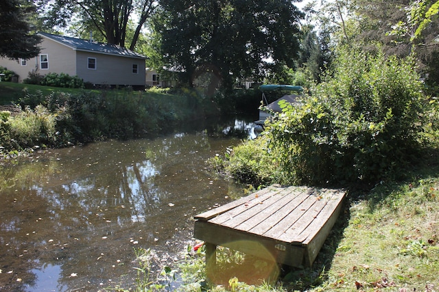 17980 1ST Callejon, Barryton, MI 49305 - view of dock with a water view