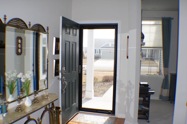 foyer entrance with baseboards