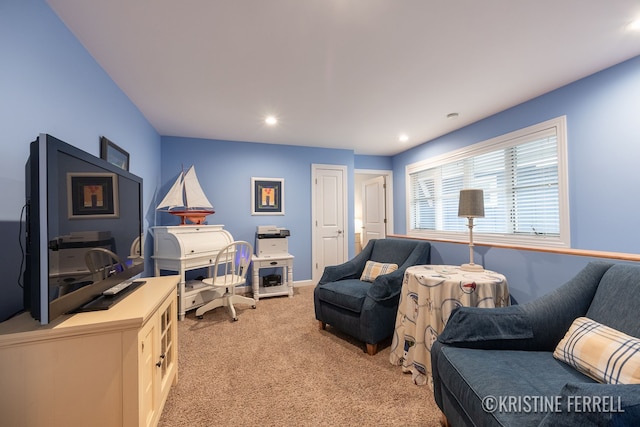 living room featuring recessed lighting and light carpet