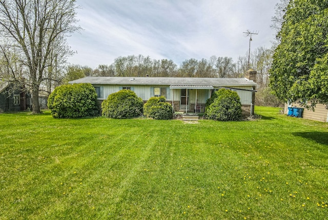 13423 Duffield Rd, Montrose, MI 48457 - view of front of property featuring a front yard and a chimney