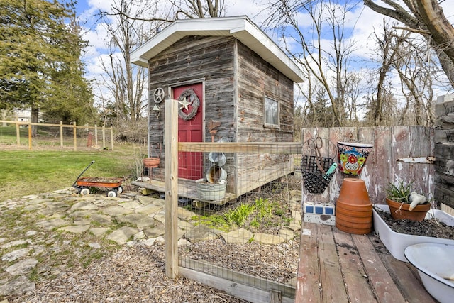 220 Nottingham Dr, Brooklyn, MI 49230 - view of outbuilding with fence and an outbuilding