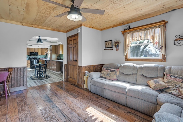 220 Nottingham Dr, Brooklyn, MI 49230 - living room with a ceiling fan, light wood-style flooring, wainscoting, and wooden ceiling