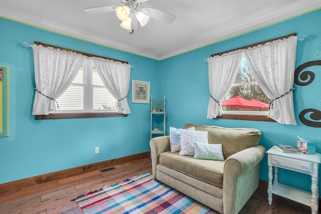 220 Nottingham Dr, Brooklyn, MI 49230 - sitting room with baseboards, plenty of natural light, ceiling fan, and wood finished floors