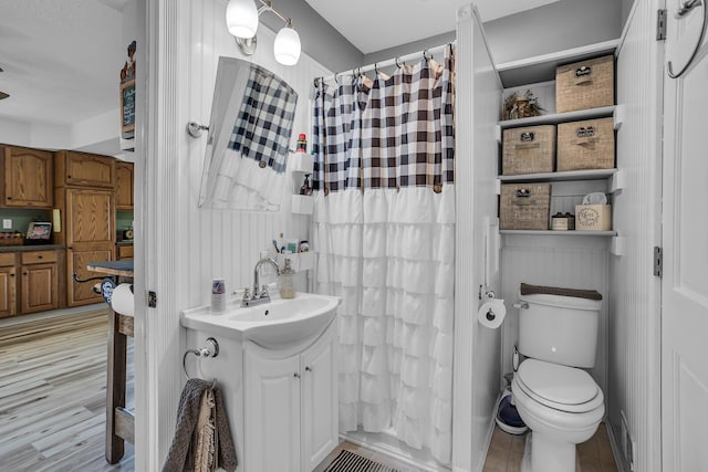 220 Nottingham Dr, Brooklyn, MI 49230 - bathroom featuring toilet, curtained shower, and vanity