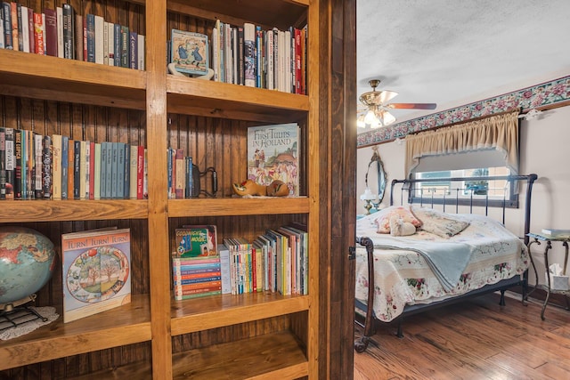 220 Nottingham Dr, Brooklyn, MI 49230 - bedroom featuring a textured ceiling and wood finished floors