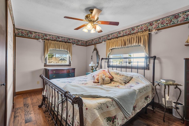 220 Nottingham Dr, Brooklyn, MI 49230 - bedroom with baseboards, a ceiling fan, a textured ceiling, and wood finished floors
